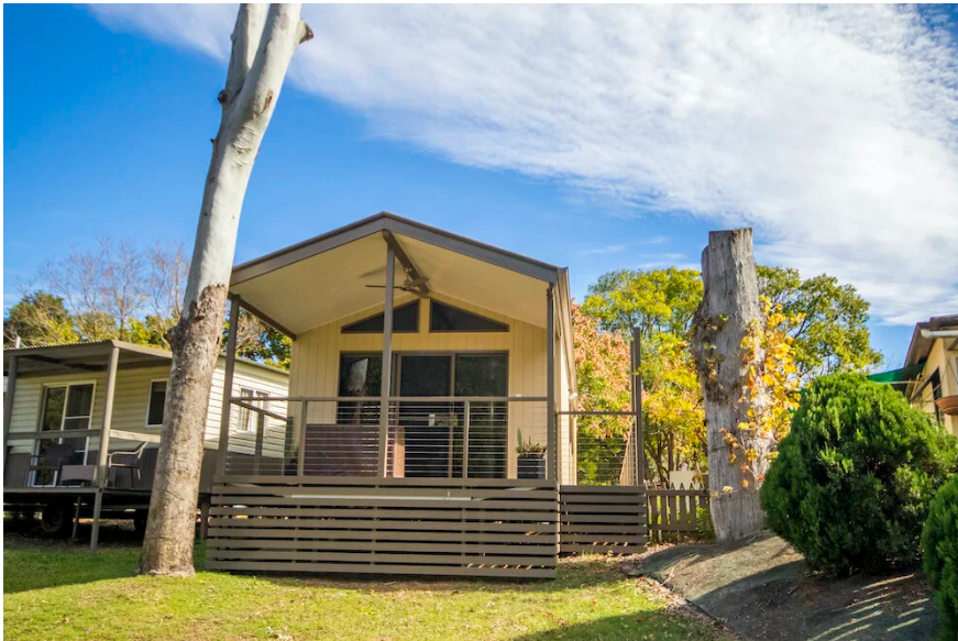 A modern and comfortable cabin nestled amongst the trees at the Esk Caravan Park